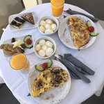 breakfast served on our patio | Photo taken by Alexandra S
