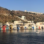 We also sail by "Little Venice",  where Mick and I walked to the day before.  It was fun to see the colorful old cave like homes, called siramata from the sea.  What a blast we had, making new friends, sailing the blue sea, eating, laughing and swimming! This island is a gem. | Photo taken by Kris M