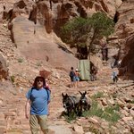 After hiking up to the Monastery, there is a long hike down to the "main road" of the Petra monuments. Brad combined his keffiyeh and his safari hat to create the maximum block from the sun! | Photo taken by Rich W