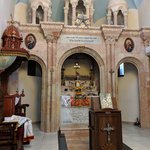 We were fortunate to stop by the Syrian Orthodox Church of the Virgin Mary near the end of the service, conducted in Aramaic, the language spoken during Jesus' time. Khadra knew the sexton of the church, who showed us the altar and a priceless Bible. | Photo taken by Rich W