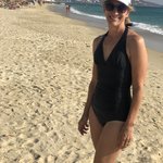 The beaches were long, sandy and beautiful.  We put our towels down and walked the shores. | Photo taken by Kris M