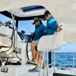 Sailing Day of Naxos; The Crew (Jannis and Demitri) at the Helm | Photo taken by Tom B