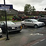 Tractors in train station parking lot | Photo taken by Valerie M