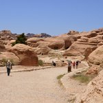 Just after the entrance to the Petra archaeological site, you start to see monuments and carvings, but the famous, "must-see" Treasury is a hike of about 2-3 miles (although the "official," but inaccurate signage and website will say it's only a half mile, my step counter and my sore feet said otherwise). | Photo taken by Rich W