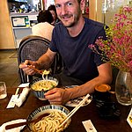 Feasting on noodles | Photo taken by Joost S