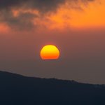 Sunset from our hotel room balcony. | Photo taken by Dave H
