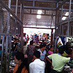 Busy. Every day people (women) start their day by buying fresh food at the market for the day. | Photo taken by Rodney S