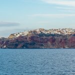 Iron rich sedimentary rocks in cliff face of Oia | Photo taken by David B
