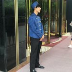Porter at hotel in Shanghai  | Photo taken by Gary C
