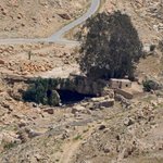 The rock and spring shown in this photo are one of two places that Biblical historians think the actual bringing forth of water for the tribe of Israelites took place. | Photo taken by Rich W