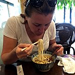 Feasting on noodles | Photo taken by Joost S