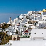 Cliffside hotels and houses of Imerovigli | Photo taken by David B
