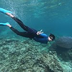 Dhiman enjoying the corals! | Photo taken by Debajyoti R