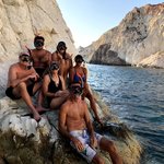 We stopped at a beach and grabbed our snorkel gear and swam through caves and crevices. There weren't many fish to  be seen, but it was a blast.  One of our guides did a "magic" trick for us and showed us and showed us using the tricks of floating pumice rock, that is plentiful in the area. | Photo taken by Kris M