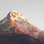 Is it a painting or a photograph? sunrise at Poon Hill | Photo taken by Wayne P