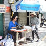 the seamstress - business is brisk | Photo taken by Amy J