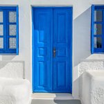 Blue door and windows of Santorini | Photo taken by David B