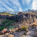 Imerovigli in the clouds, taken from Skaros rock | Photo taken by David B