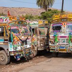 Decorated trucks on the road to Ranthambore are"Modern Day Elephants" used for commerce as well as a place to eat and sleep for the drivers. | Photo taken by Jean M