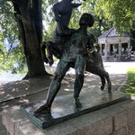 Boy and a goat infront of the lake | Photo taken by florence P