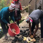 Fredy and neighbors preparing our meal | Photo taken by Elisa M