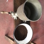 Hand grinding coffee On Salkantay  | Photo taken by Janice H