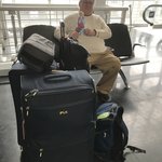 In the airport with our bags | Photo taken by Vickie B