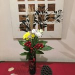 Beautiful florals everywhere and on the floor, cricket cages for “live music” | Photo taken by Louise I