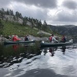 Canoeing across the lake to start our hike | Photo taken by florence P