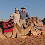 Late in the afternoon at the Memoriet Aicha Camp, we rode these camels into the desert to watch the sunset over the rugged rocks and red sand. For the record, we did NOT break the proverbial camels’ backs!  - Wadi Rum, Jordan | Photo taken by Rich W