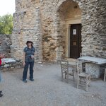 Hike to Apeiranthos; Monastery Fotodoti; Costas (Our Guide) and Ruth in the Courtyard | Photo taken by Tom B