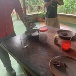Grinding cocoa nibs to make chocolate  | Photo taken by Diane B