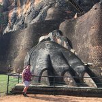 Giant Lion's paws are all that remain of the forbidding entrance. | Photo taken by Sylvanna C