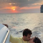 The sunset was gorgeous and  although we never had a rehearsal for the wedding, Maggie and Bauer practiced kissing a lot!  | Photo taken by Kris M