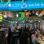 We visited Jordan during Ramandan, the month of fasting by Muslims. After the sunset call to prayer, the iftar (breaking of the fast) is a big celebration.  Akram, our driver, recommeneded Hashem Restaurant in downtown Amman. This hole-in-the-wall restaurant seems chaotic because the waiters are scurrying around the maze of indoor and outdoor tables to serve their delicious, inexpensive, vegetarian fare.  | Photo taken by Rich W