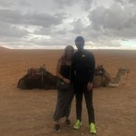 Camel ride to camp in a sand storm... kinda scary but full on awesome.  | Photo taken by Amber S