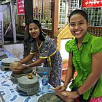 Merit earning at a neighbourhood temple. | Photo taken by Rodney S
